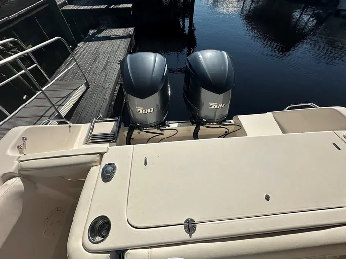  Yacht Photos Pics 2020 Grady-White Canyon 306 boat with twin 300 horsepower engines at dock.