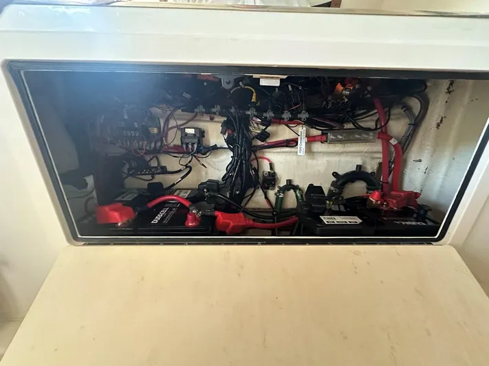  Yacht Photos Pics Electrical compartment of 2020 Grady-White Canyon 306 boat, showcasing wiring and components.
