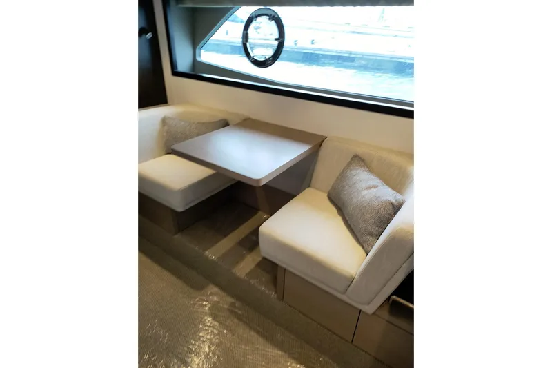 Elixa Yacht Photos Pics Luxurious interior seating area on 2022 Sunseeker Manhattan 68 yacht.