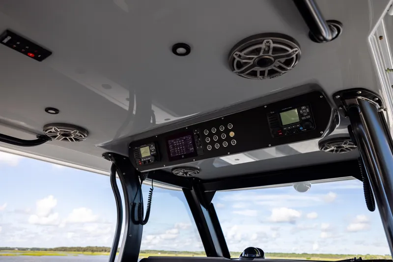  Yacht Photos Pics Interior view of 2023 Freeman 47 boat's control panel and speakers.