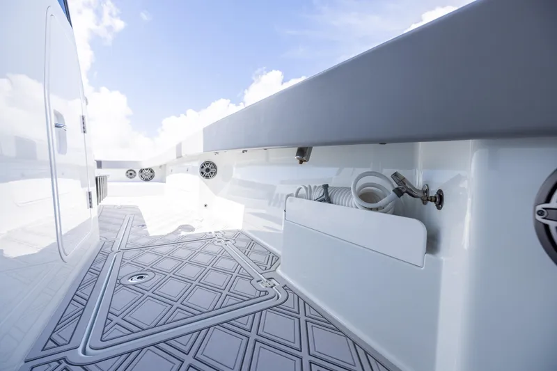  Yacht Photos Pics 2023 Freeman 47 boat deck with modern design and built-in speakers.