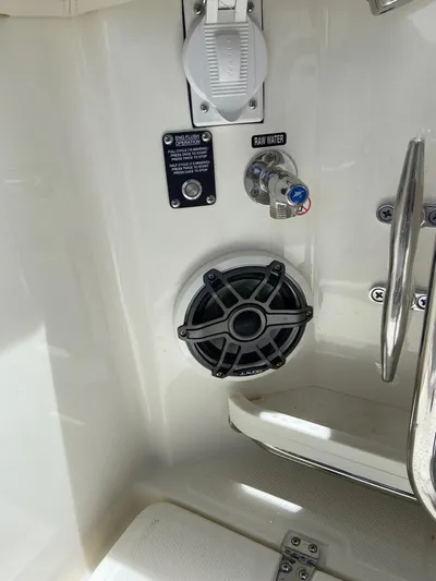  Yacht Photos Pics 2021 Boston Whaler 350 Realm boat interior with speaker and water control.