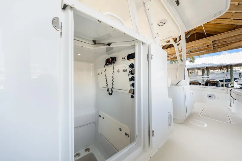  Yacht Photos Pics 2015 Yellowfin 39 boat interior with control panel and seating area.
