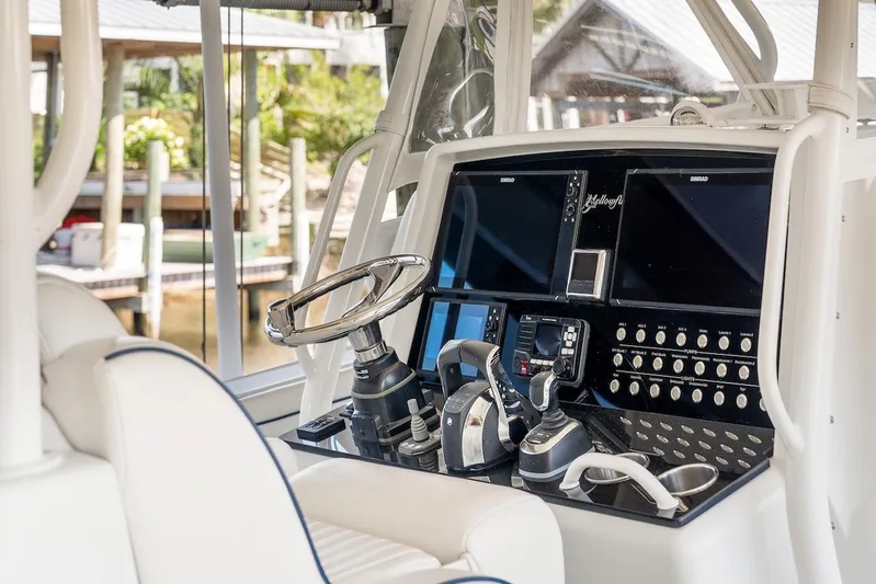  Yacht Photos Pics 2015 Yellowfin 39 boat helm with dual screens and control panel.