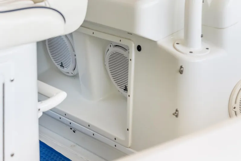  Yacht Photos Pics 2015 Yellowfin 39 boat interior with built-in speakers and white seating.