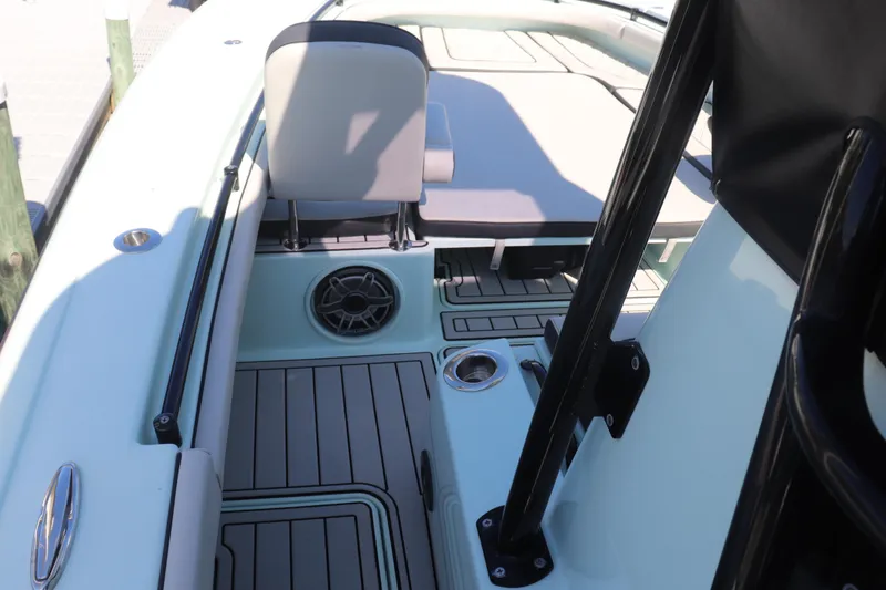 Island Time Yacht Photos Pics 2020 BARKER 26 boat interior with seating and speaker detail.