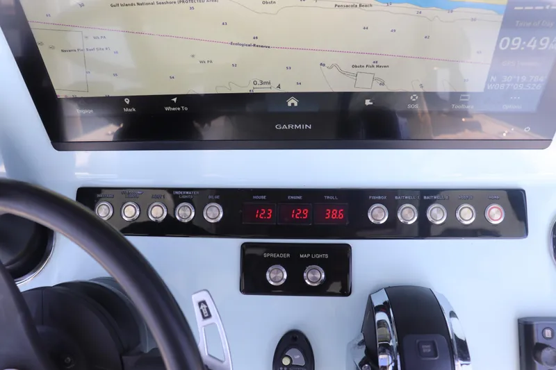 Island Time Yacht Photos Pics Dashboard of a 2020 BARKER 26 boat with Garmin navigation system.