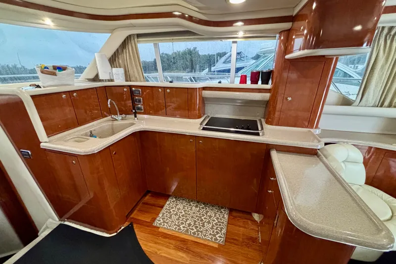  Yacht Photos Pics Luxurious kitchen interior of 2003 Sea Ray 480 Sedan Bridge yacht.
