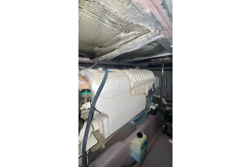  Yacht Photos Pics Engine room of 2003 Sea Ray 480 Sedan Bridge with visible components and insulation.