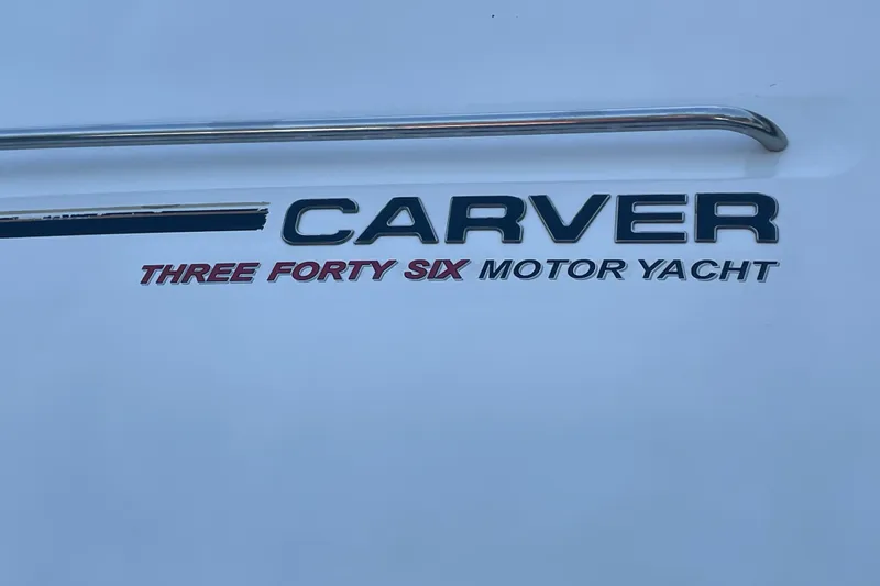  Yacht Photos Pics 2002 Carver 346 Aft Cabin motor yacht branding on white surface.
