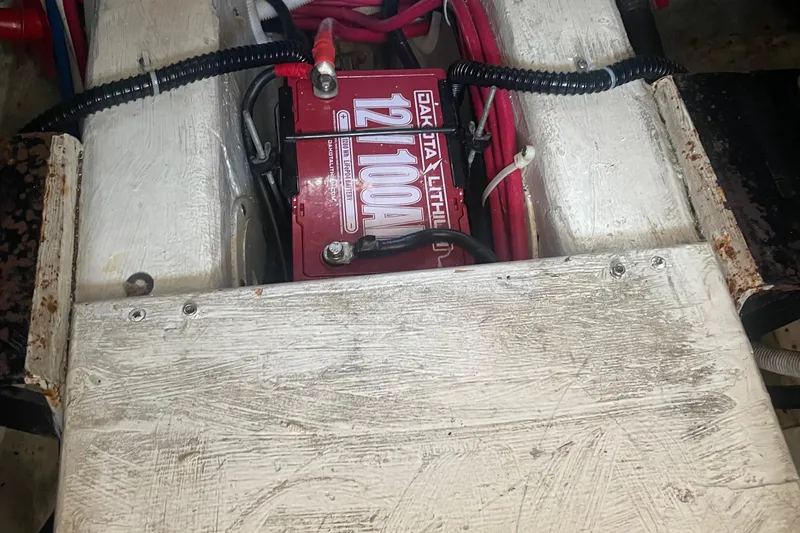  Yacht Photos Pics Battery compartment of 2002 Carver 346 Aft Cabin with visible wiring and connections.