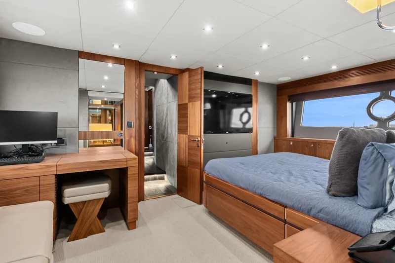  Yacht Photos Pics Luxurious master bedroom on a 2014 Sunseeker 75 Yacht with modern furnishings.