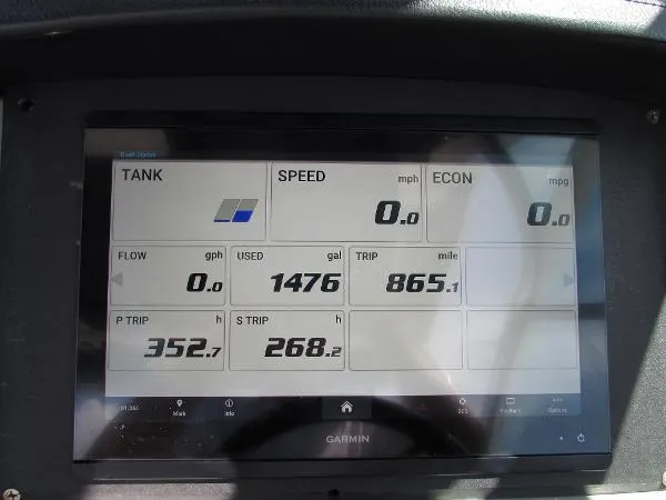 317-147 Ray Brokerage Yacht Photos Pics Garmin display on 2018 Robalo R317 Dual Console showing fuel and trip data.