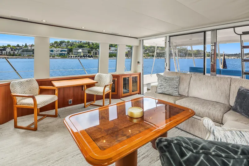 Escencia Yacht Photos Pics Luxurious interior of a 2003 Pacific Mariner Pilothouse yacht with waterfront views.