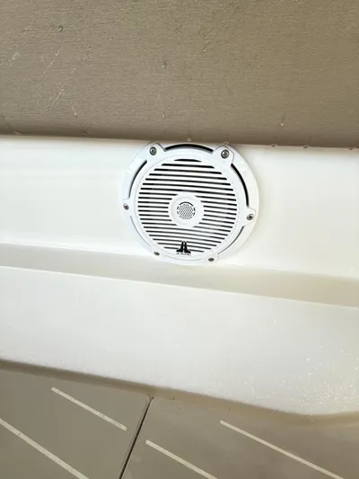  Yacht Photos Pics Speaker on 2019 Axopar 28 CABIN boat interior wall.