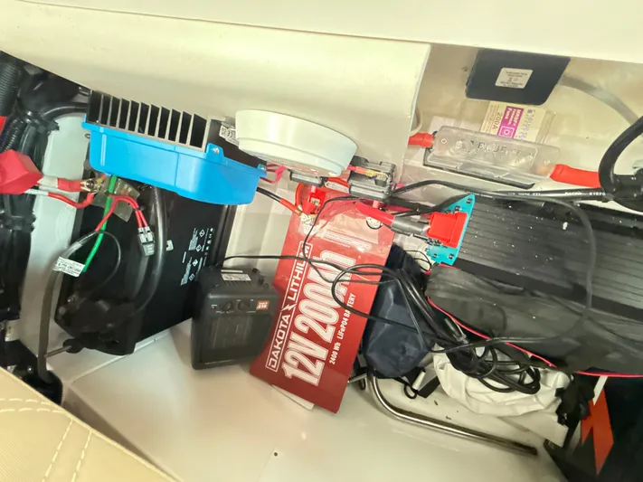  Yacht Photos Pics Electrical components inside a 2019 Axopar 28 CABIN boat, featuring a 12V battery system.