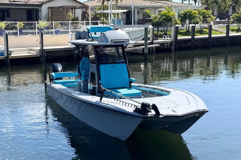  Yacht Photos Pics 2026 Costa Custom Boats 264 HC in a serene waterfront setting.