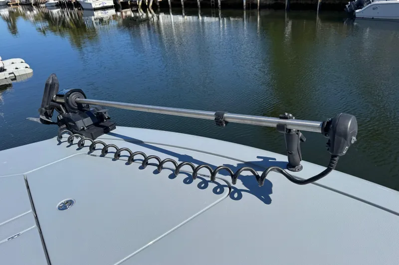  Yacht Photos Pics 2026 Costa Custom Boats 264 HC with trolling motor on calm water.