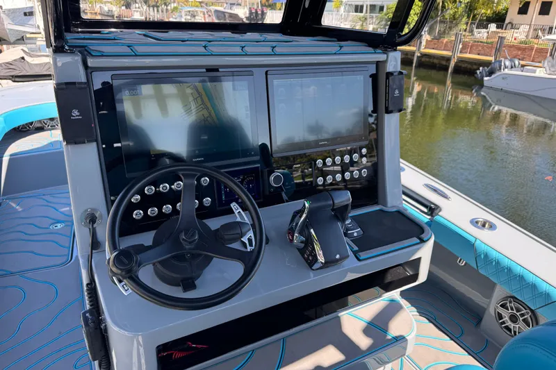  Yacht Photos Pics 2026 Costa Custom Boats 264 HC helm with advanced navigation displays and controls.