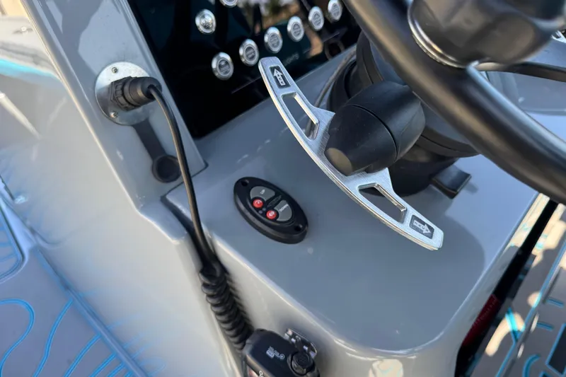  Yacht Photos Pics Control panel of 2026 Costa Custom Boats 264 HC, featuring steering and electronic controls.