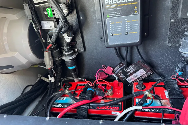  Yacht Photos Pics Electrical system of 2026 Costa Custom Boats 264 HC, featuring batteries and wiring components.