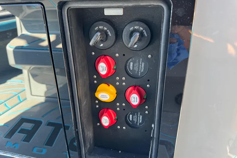  Yacht Photos Pics Control panel of 2026 Costa Custom Boats 264 HC with switches and key ignition.