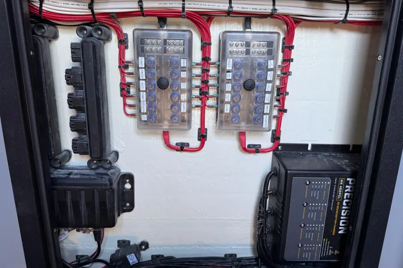  Yacht Photos Pics Electrical panel of 2026 Costa Custom Boats 264 HC with wiring and precision charger.