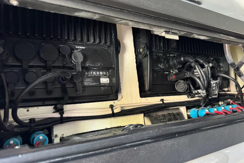  Yacht Photos Pics Electrical components inside a 2026 Costa Custom Boats 264 HC, featuring wiring and connectors.