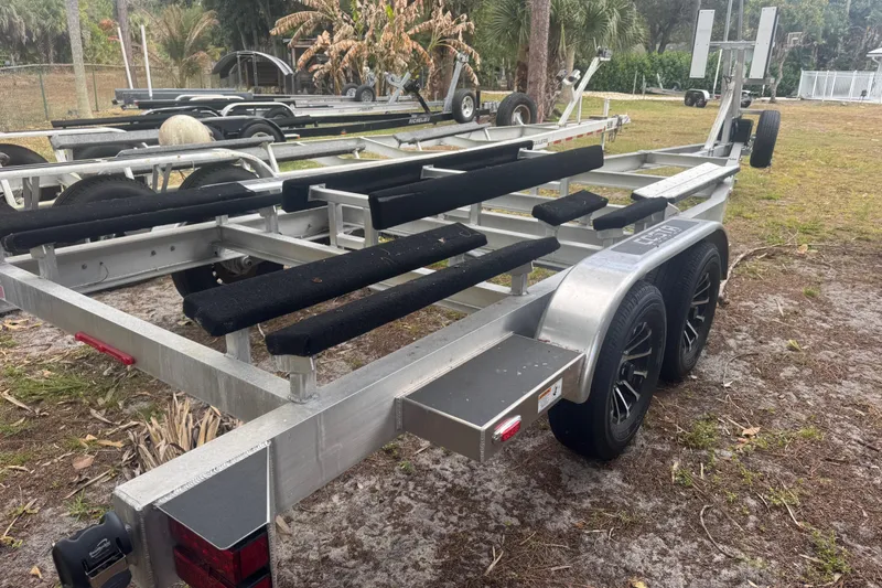  Yacht Photos Pics Trailer for 2026 Costa Custom Boats 264 HC, parked on grassy area.