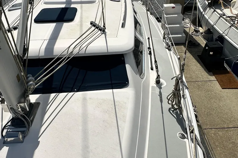 Ms Bea Haven Yacht Photos Pics 2006 Hunter 41 Deck Salon sailboat docked, showcasing deck and rigging details.