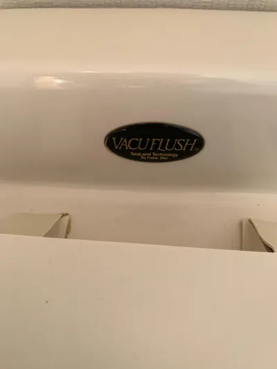Pier Pressure Yacht Photos Pics VacuFlush system in a 2000 Viking 50 Convertible yacht bathroom.