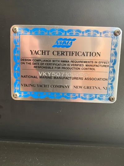 Pier Pressure Yacht Photos Pics Yacht certification plaque for 2000 Viking 50 Convertible by Viking Yacht Company.