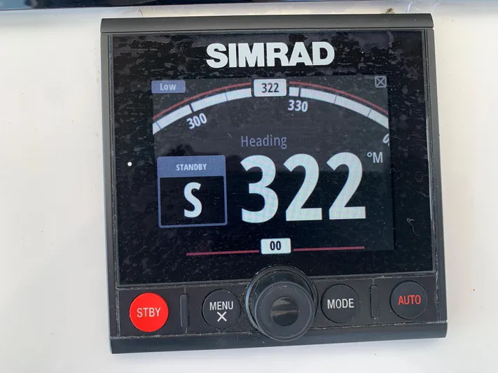 Pier Pressure Yacht Photos Pics Simrad navigation display showing heading 322° on a Viking 50 Convertible, 2000 model.