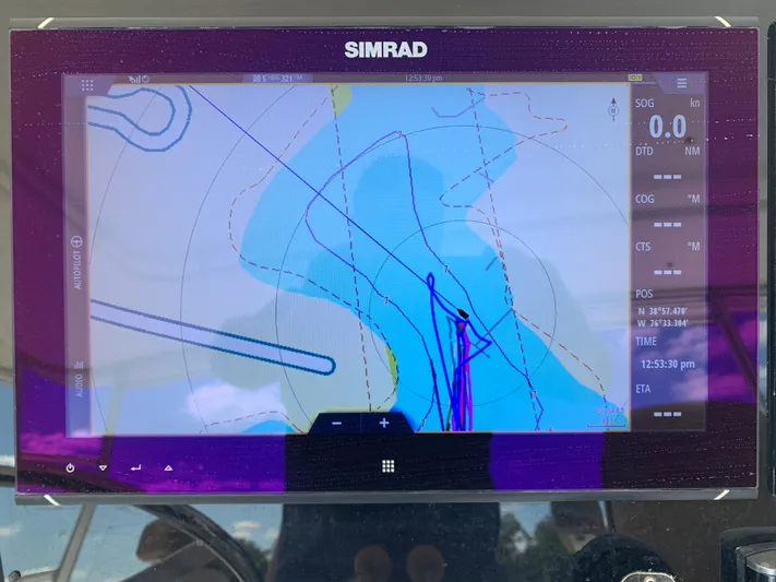 Pier Pressure Yacht Photos Pics Simrad navigation display on a 2000 Viking 50 Convertible boat, showing nautical chart.
