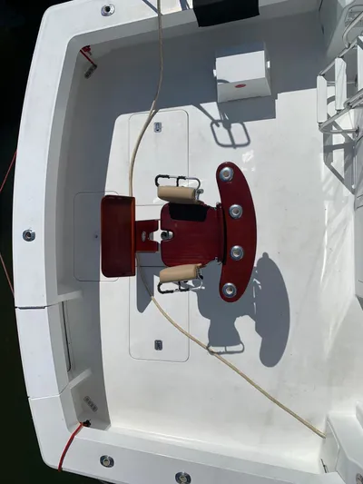 Pier Pressure Yacht Photos Pics Overhead view of a 2000 Viking 50 Convertible yacht's deck with fishing chair.