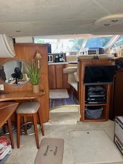  Yacht Photos Pics Interior of a 2001 Silverton 410 Sport Bridge yacht with cozy seating and modern amenities.