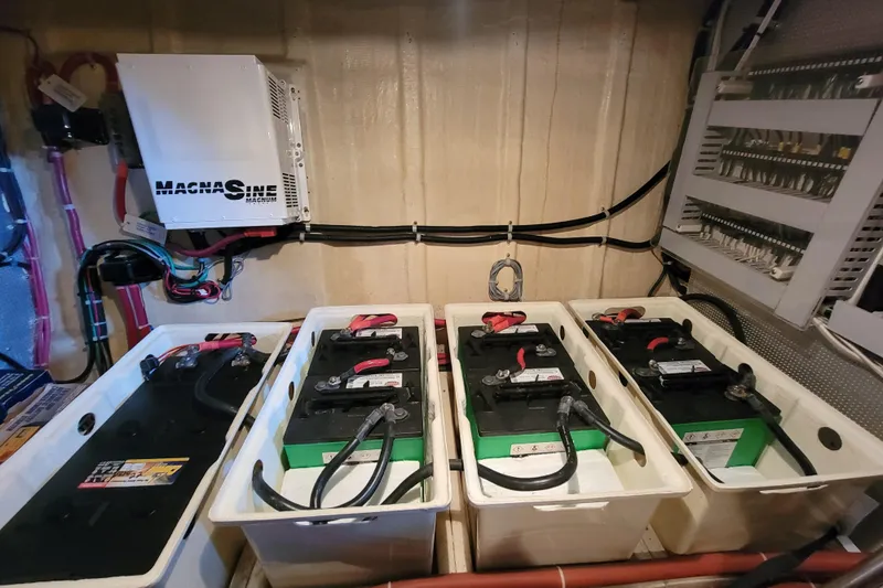 Greymalkin II Yacht Photos Pics Battery compartment of 2008 North Pacific 39 Pilothouse with Magnum inverter and wiring.