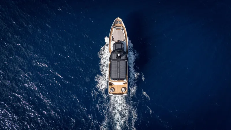 Numarine 30xp Yacht Photos Pics Aerial view of 2025 Numarine 30XP yacht cruising in deep blue ocean.