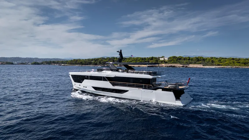 Numarine 30xp Yacht Photos Pics 2025 Numarine 30XP yacht cruising on open sea under clear skies.