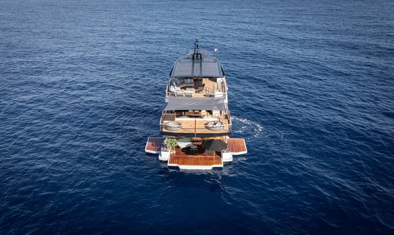 Numarine 30xp Yacht Photos Pics 2025 Numarine 30XP yacht on open sea, showcasing luxurious multi-deck design.