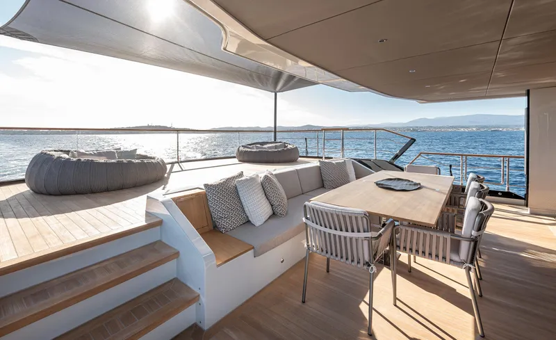 Numarine 30xp Yacht Photos Pics Luxurious 2025 Numarine 30XP yacht deck with seating and dining area, overlooking the ocean.