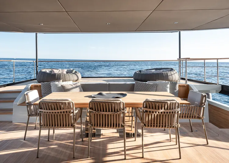 Numarine 30xp Yacht Photos Pics Outdoor dining area on 2025 Numarine 30XP yacht with ocean view.