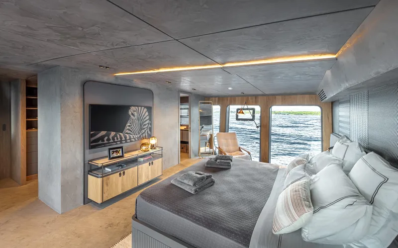 Numarine 30xp Yacht Photos Pics Luxurious bedroom interior of 2025 Numarine 30XP yacht with modern design and ocean view.