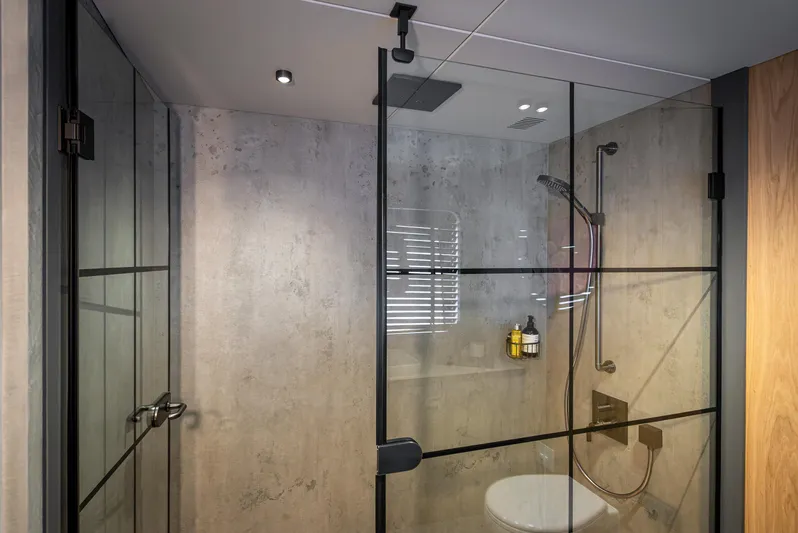 Numarine 30xp Yacht Photos Pics Luxury bathroom in 2025 Numarine 30XP yacht with modern glass shower enclosure.