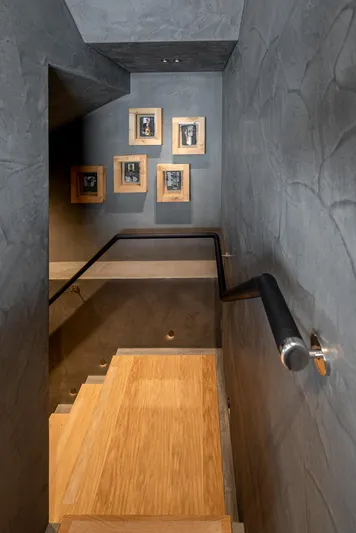 Numarine 30xp Yacht Photos Pics Staircase with wooden steps and framed photos on a Numarine 30XP yacht, 2025 model.