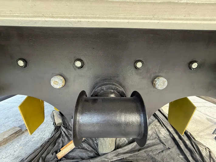 Fantasea Yacht Photos Pics Close-up of Sirena 64 yacht's hull detail, showcasing bolts and a central fitting, 2020 model.