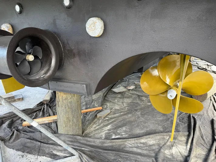 Fantasea Yacht Photos Pics Close-up of Sirena 64 yacht's propeller and thruster, 2020 model, in dry dock.