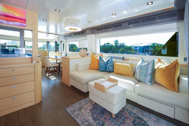 Fantasea Yacht Photos Pics Luxurious interior of 2020 Sirena 64 yacht with elegant seating and decor.