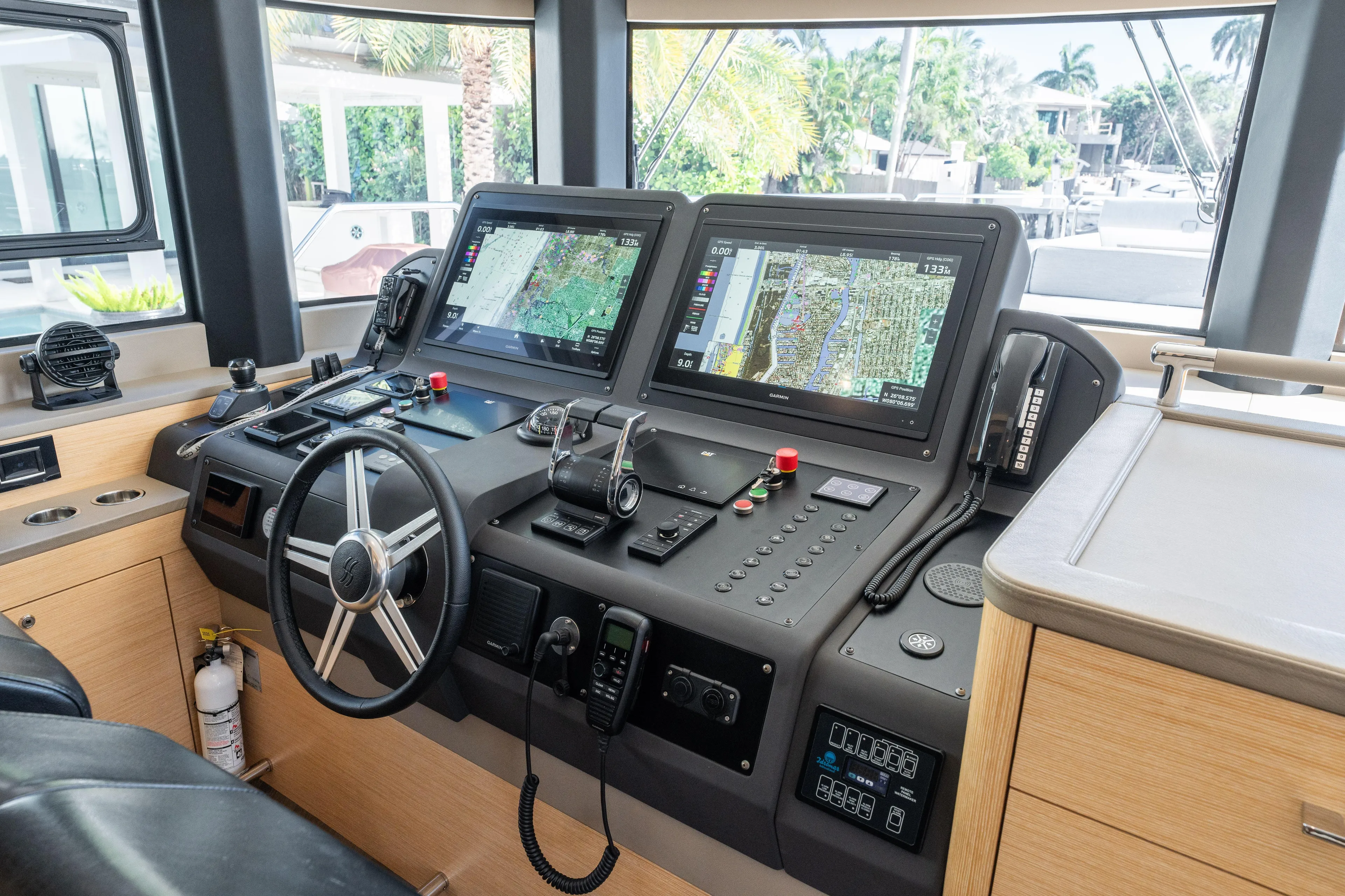 Fantasea Yacht Photos Pics Modern helm station of 2020 Sirena 64 yacht with dual navigation screens.