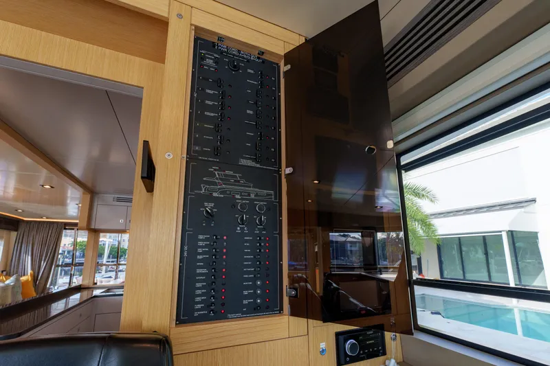 Fantasea Yacht Photos Pics Control panel inside a 2020 Sirena 64 yacht, featuring modern interior design.